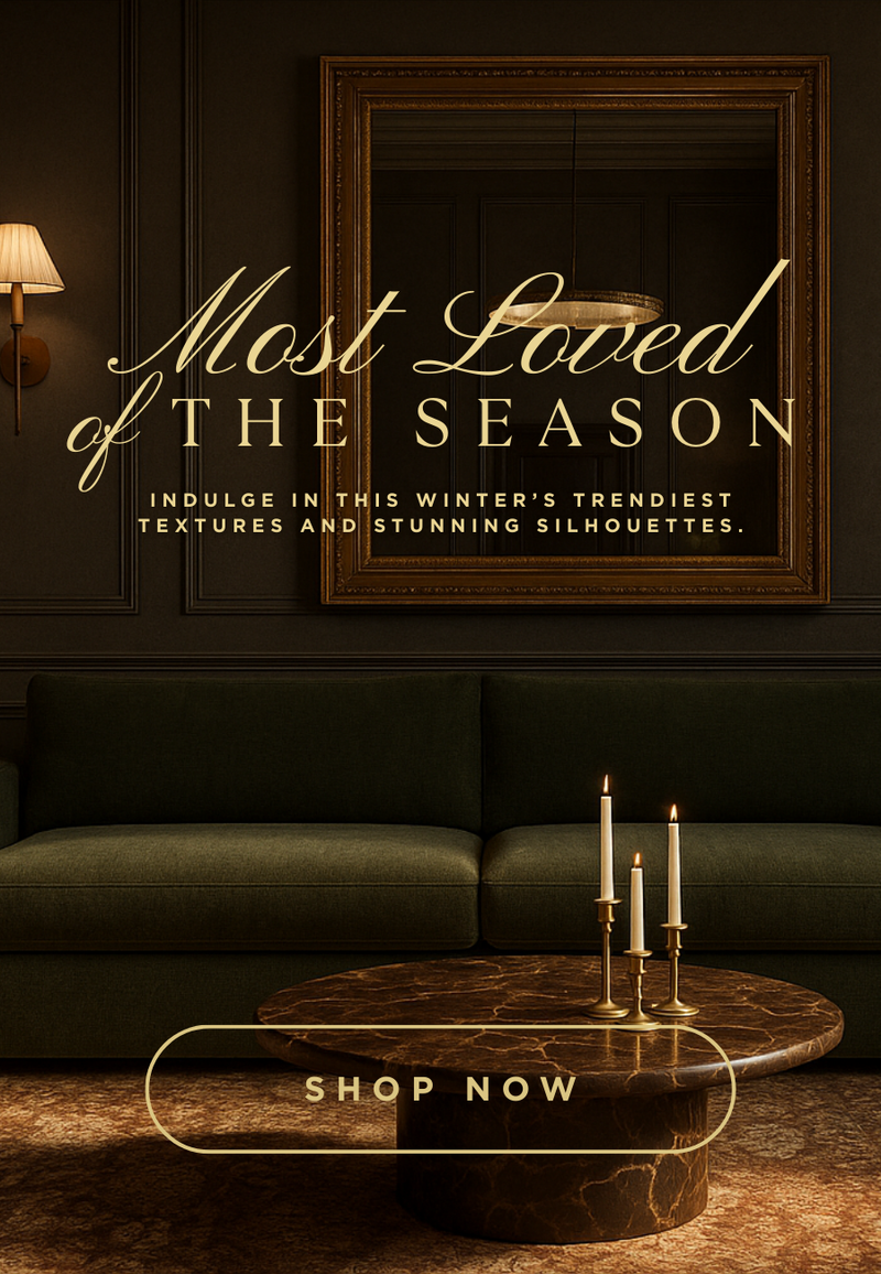 
                Dark interior setting with a couch, framed mirror, and candles, featuring text about winter trends.
              