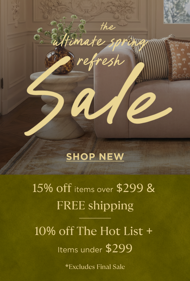 
                Advertisement for a spring refresh sale with a couch and decorative items in the background.
              