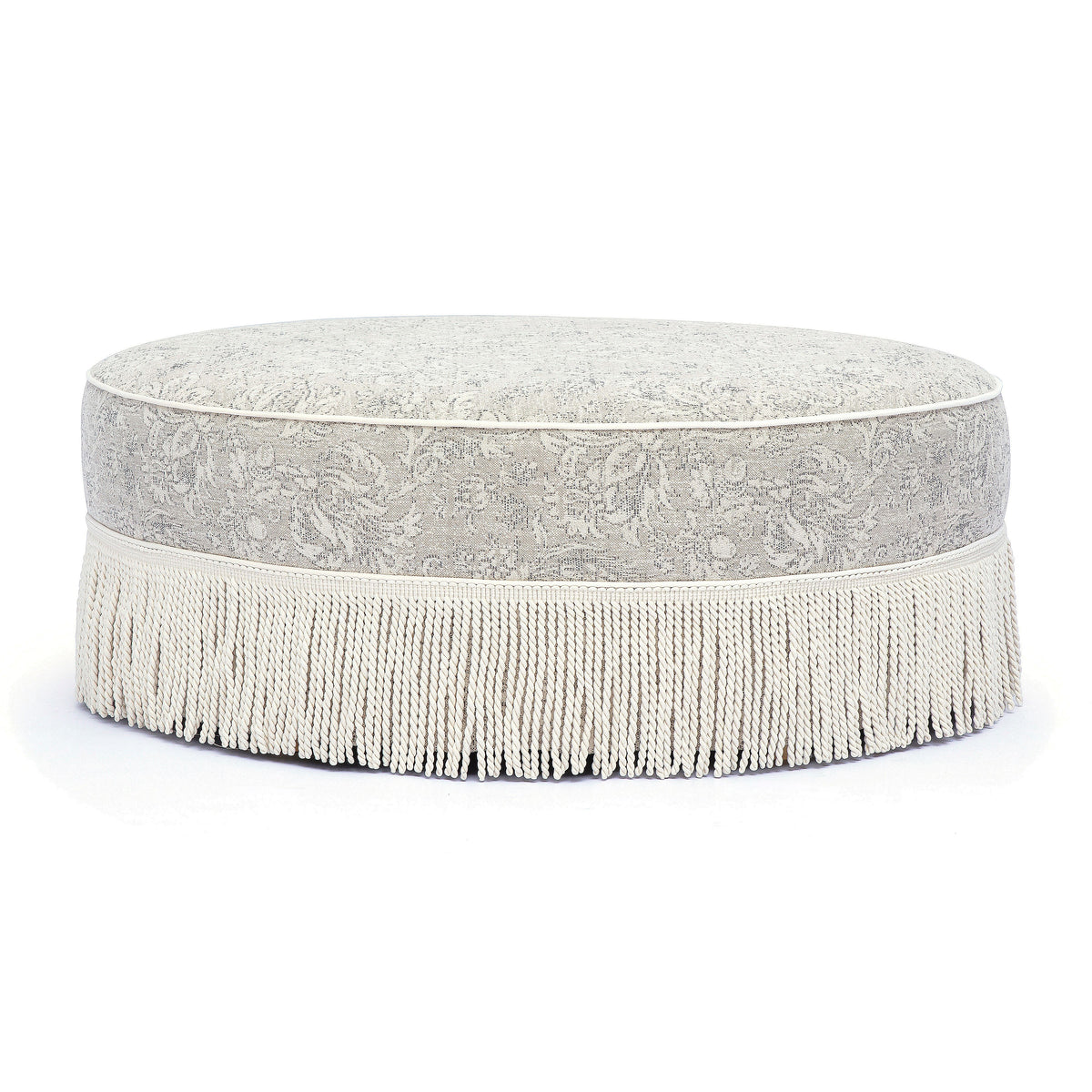 Tassy Tasseled Round Ottoman - Neutral Floral - Image 1