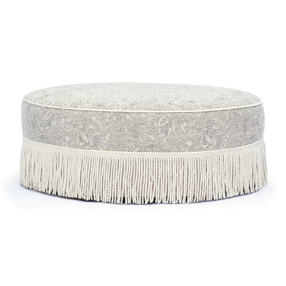Tassy Tasseled Round Ottoman - Neutral Floral - Image 1